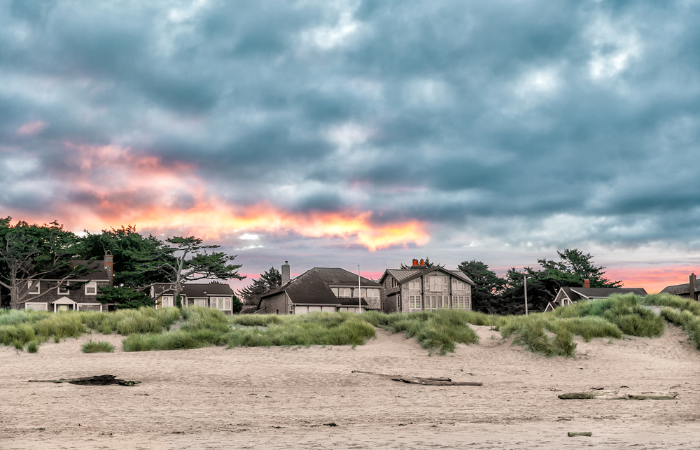 Beachfront homes at sunset in Cannon Beach Oregon